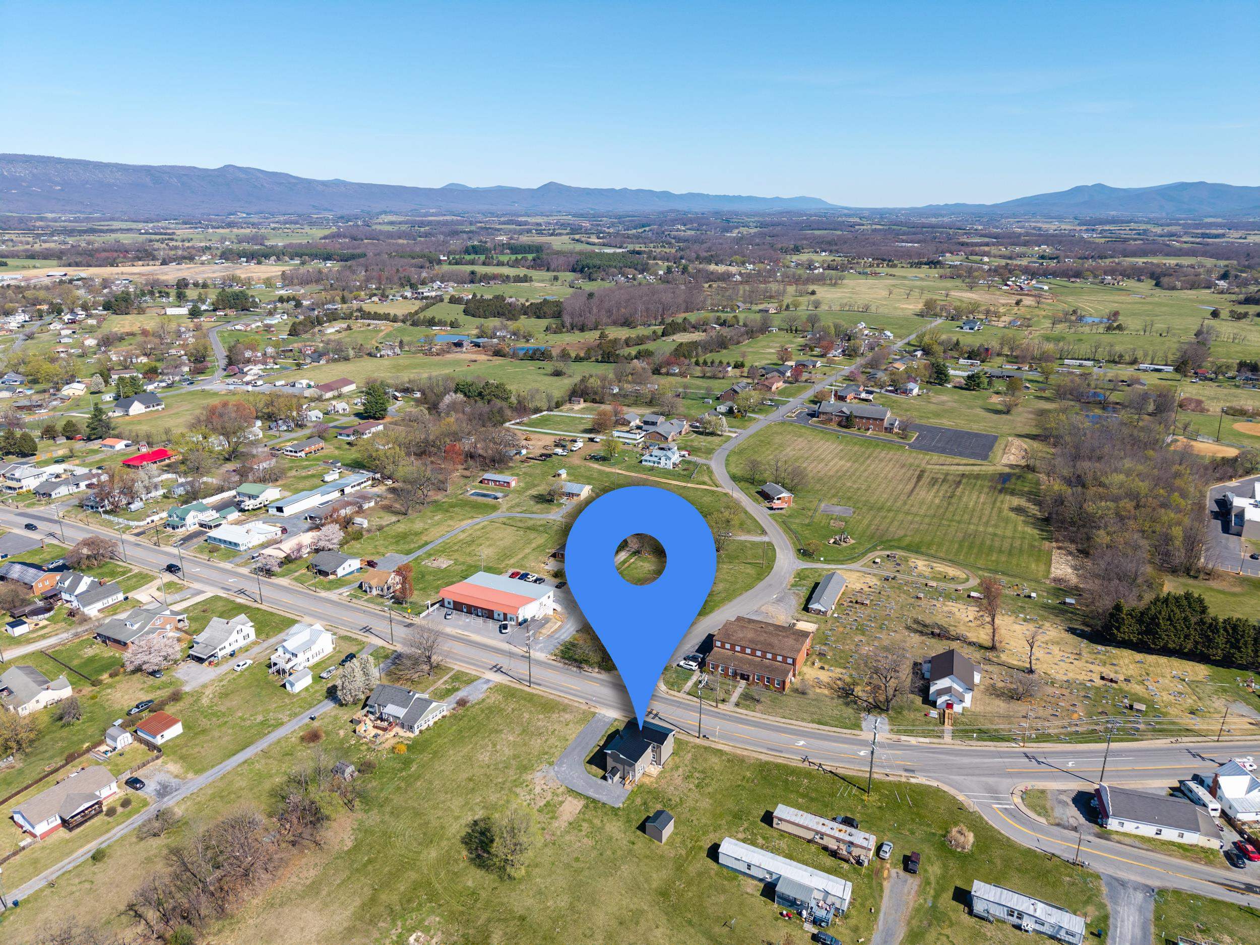 773 West Main Street Stanley, VA 22851 - Photo 63 of 66 an aerial view of a swimming pool with mountain view
