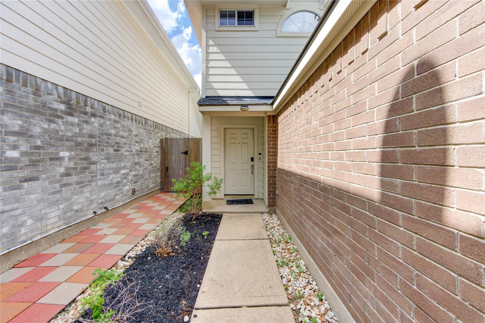 19334 Strathmore Pl Lane Katy, TX 77449 - Photo 4 of 48 a view of a pathway with a pathway