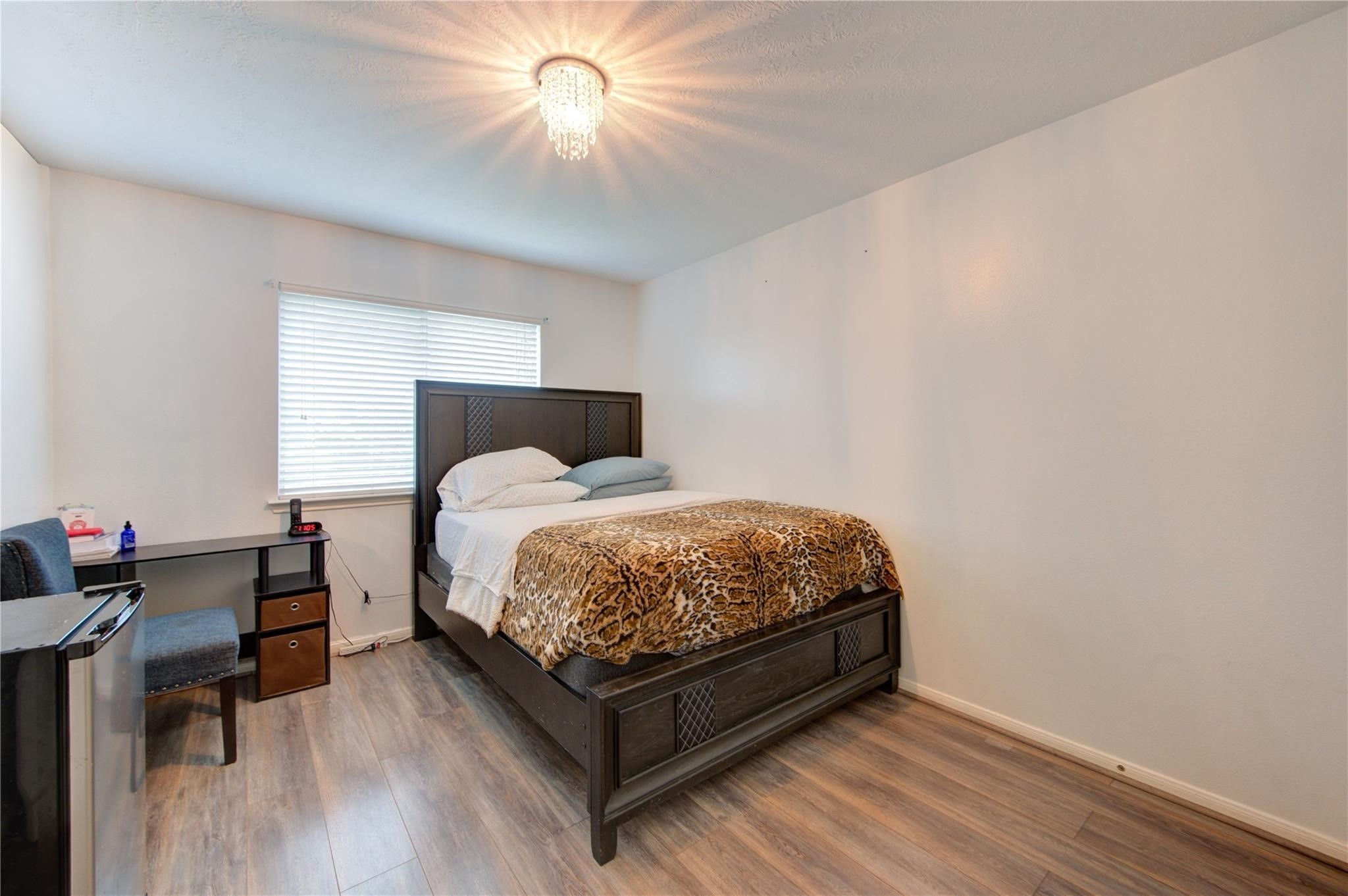 19334 Strathmore Pl Lane Katy, TX 77449 - Photo 42 of 48 a bedroom with a bed and wooden floor