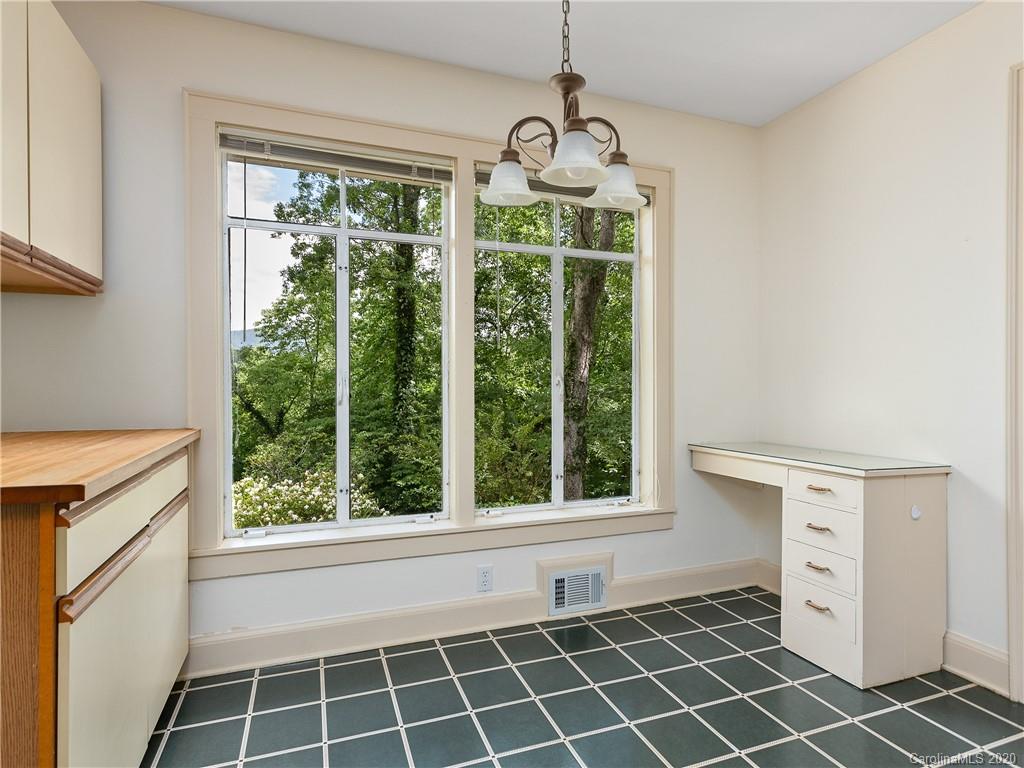 434 Hogback Mountain Road Tryon, NC 28782 - Photo 14 of 37 a view of an empty room with a window