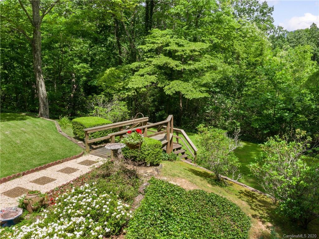 434 Hogback Mountain Road Tryon, NC 28782 - Photo 33 of 37 a green field with lots of bushes