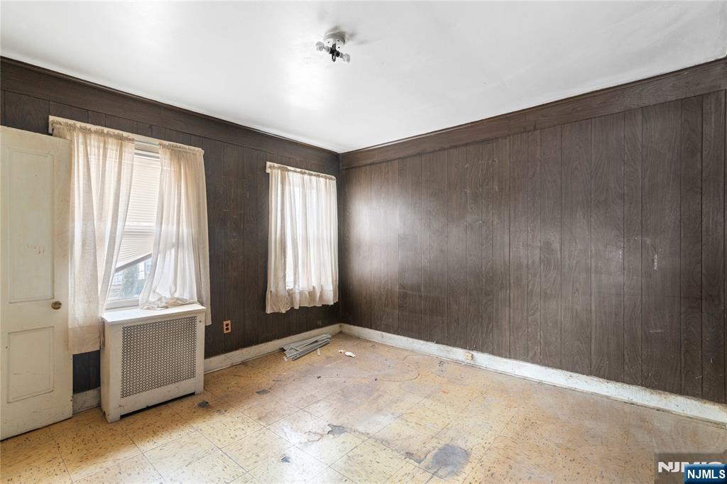 354 Hayward Street Orange, NJ 07050 - Photo 11 of 18 a view of an empty room with a window