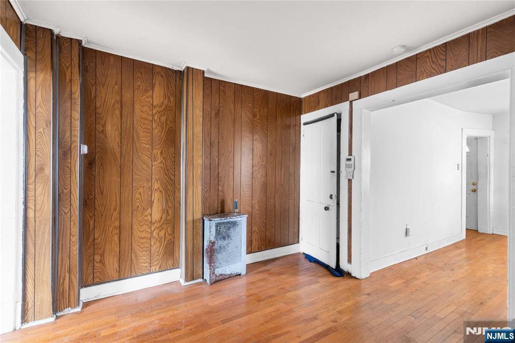 354 Hayward Street Orange, NJ 07050 - Photo 10 of 18 a view of a livingroom with wooden floor