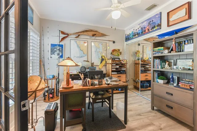 a workspace with furniture and window