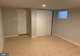 an empty room with window
