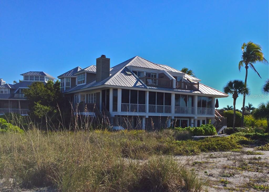 1 Seawatch Drive Boca Grande, FL 33921 - Photo 1 of 1 a front view of a house with a yard