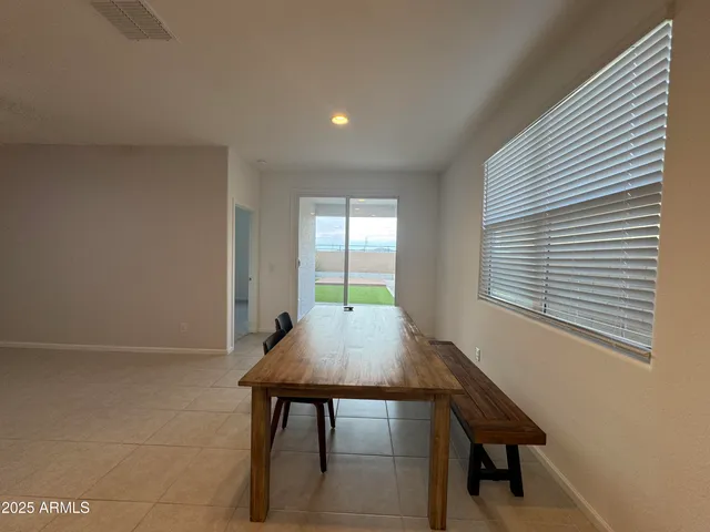 a workspace with furniture and window