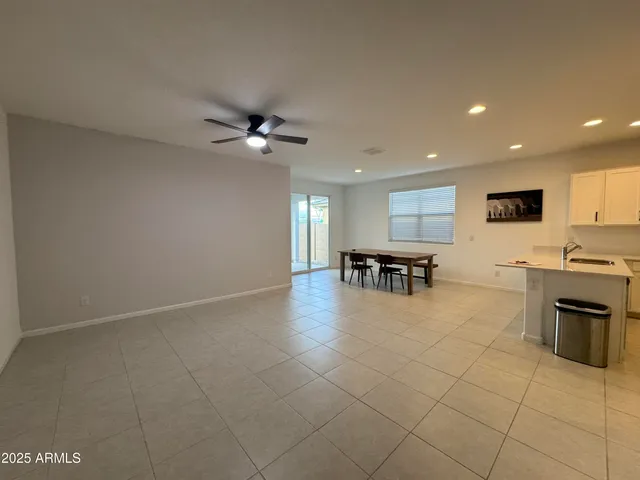 a view of a kitchen with a sink cabinets and window