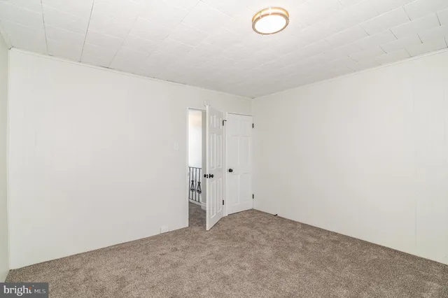 a bathroom with a sink a mirror and a shower