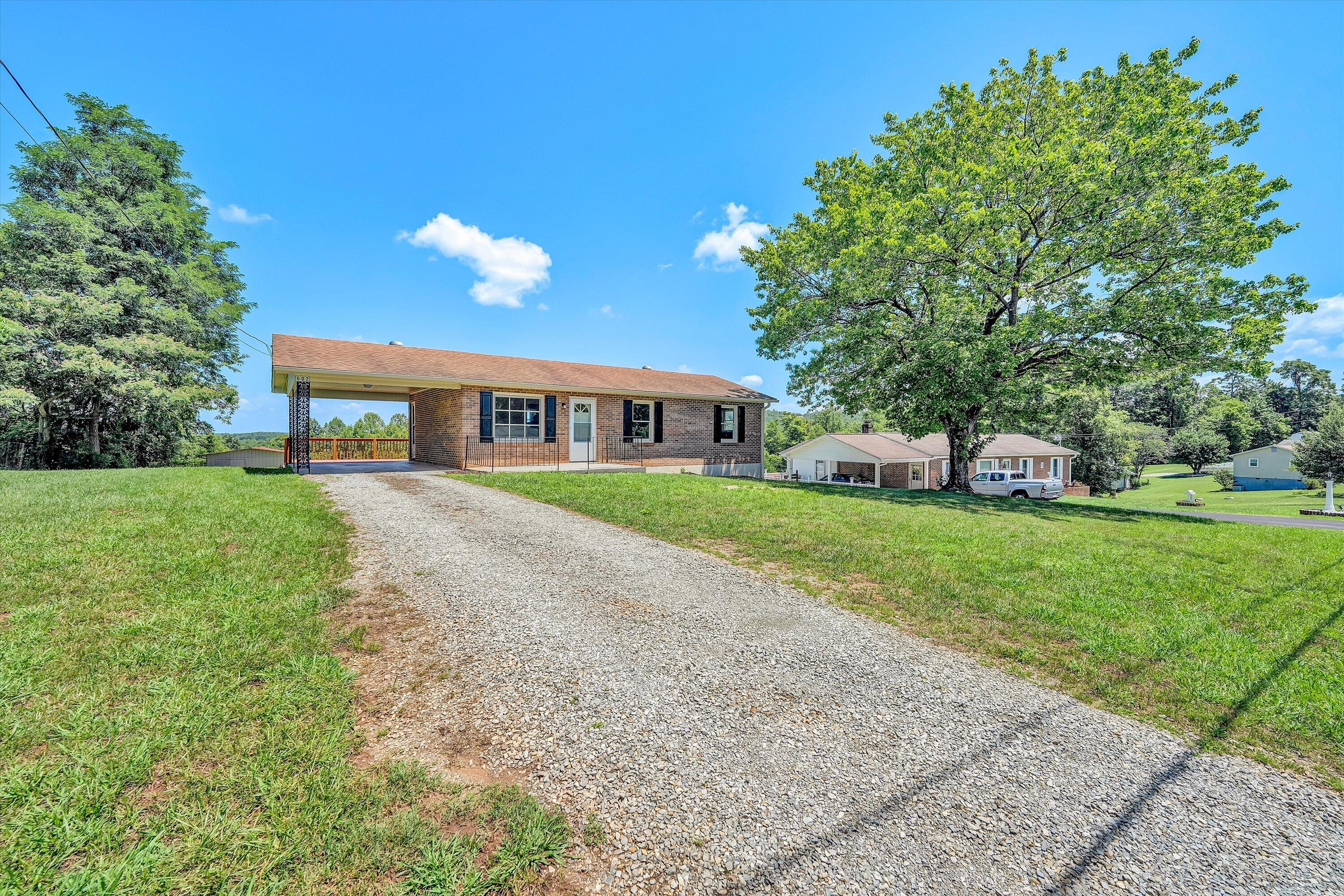 602 Power Dam Road Rocky Mount, VA 24151 - Photo 31 of 34 a house view with a garden space