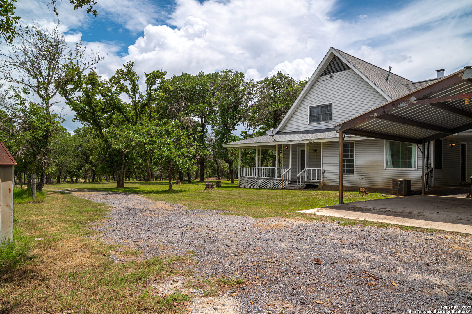 2981 Vivroux Ranch Road Seguin, TX 78155 - Photo 8 of 50 a view of a house with a yard and sitting area
