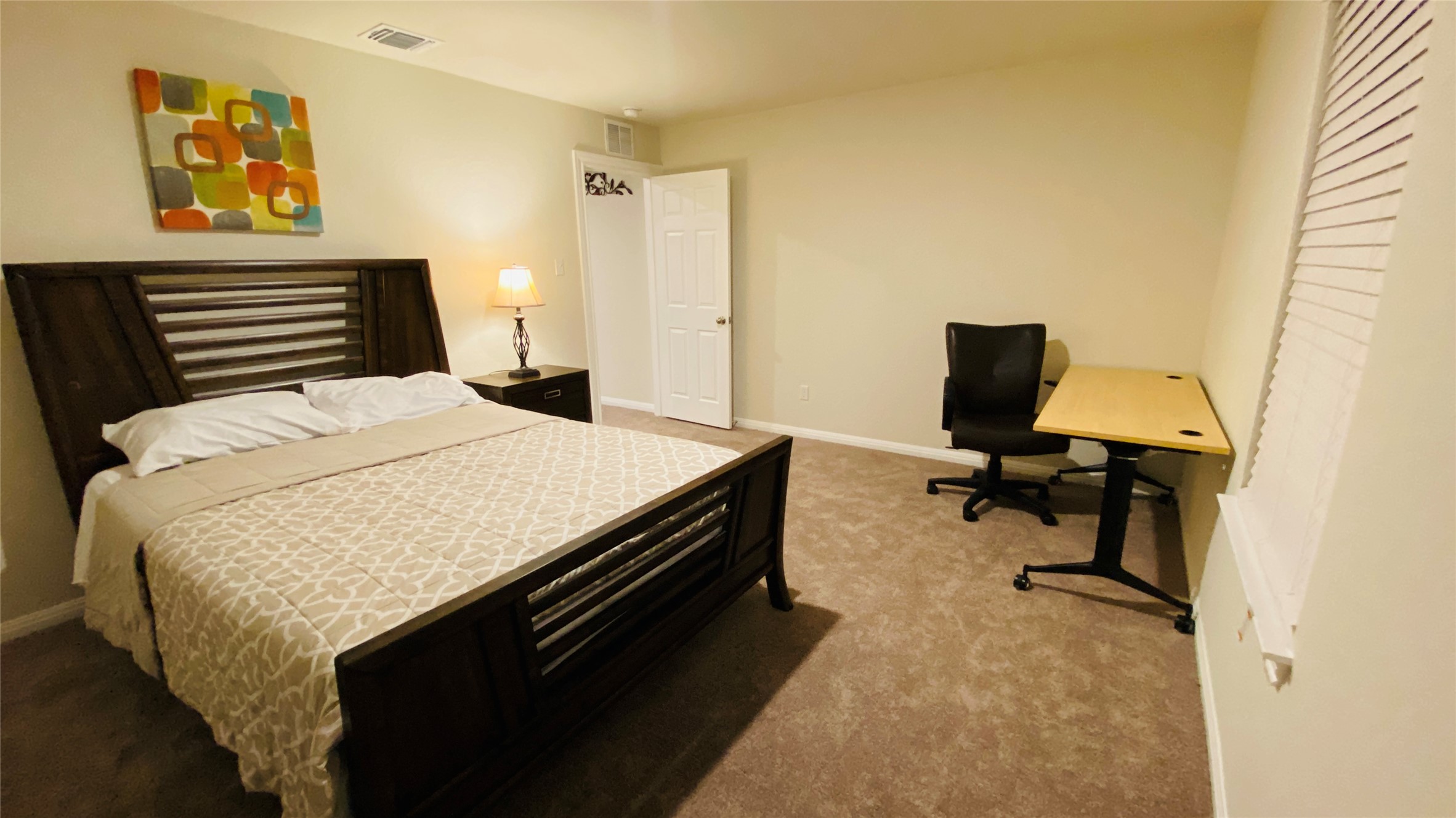 197 Prairie Falcon Way Leander, TX 78641 - Photo 19 of 29 Bedroom featuring carpet floors and baseboards