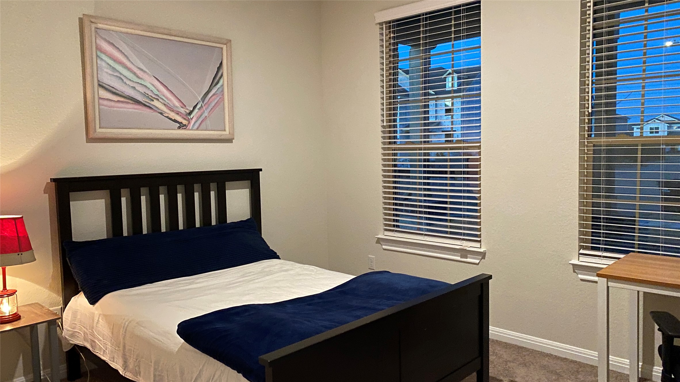 197 Prairie Falcon Way Leander, TX 78641 - Photo 26 of 29 Bedroom featuring baseboards and dark carpet