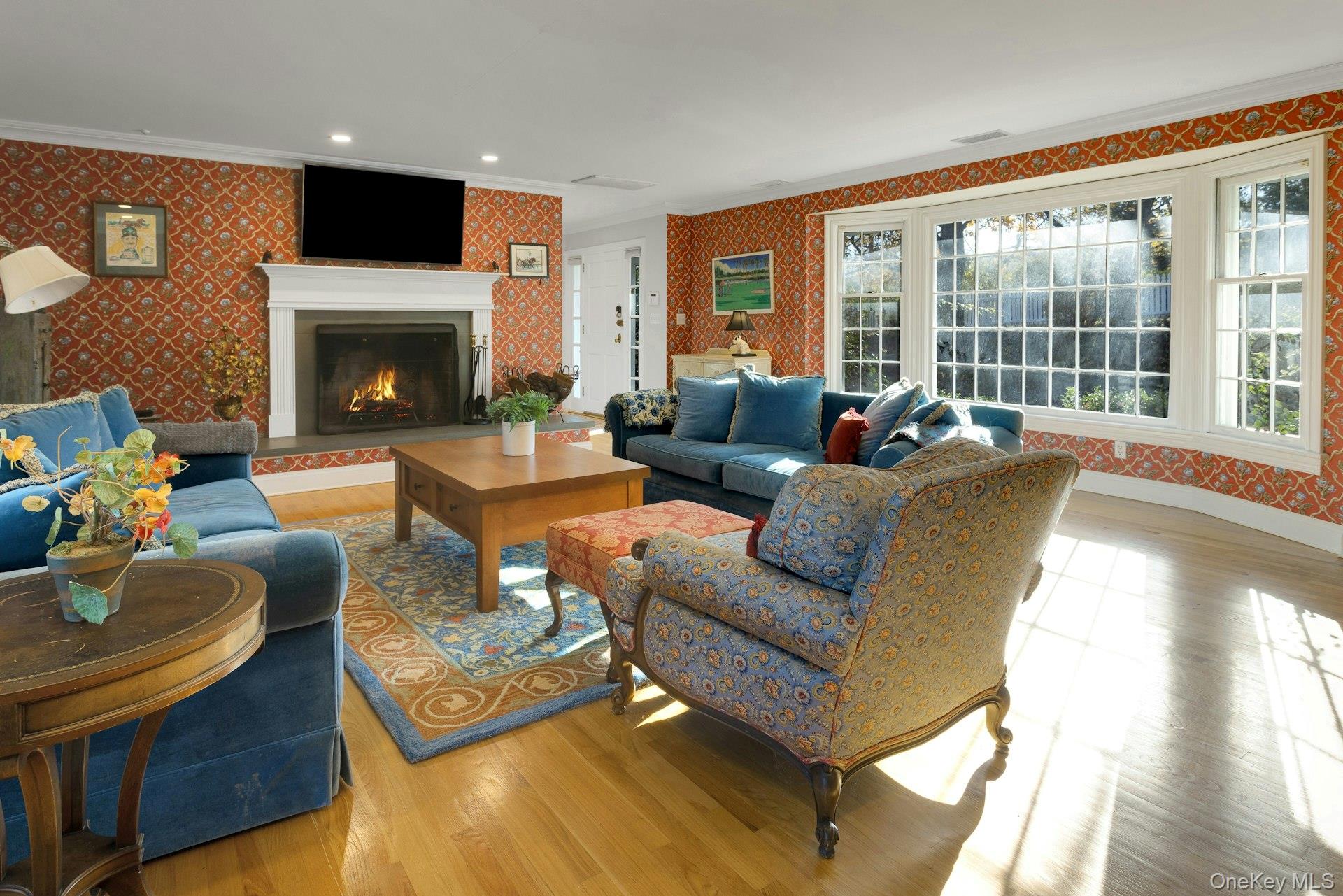 90 Cushman Road Patterson, NY 12563 - Photo 13 of 40 a living room with furniture a fireplace and a flat screen tv