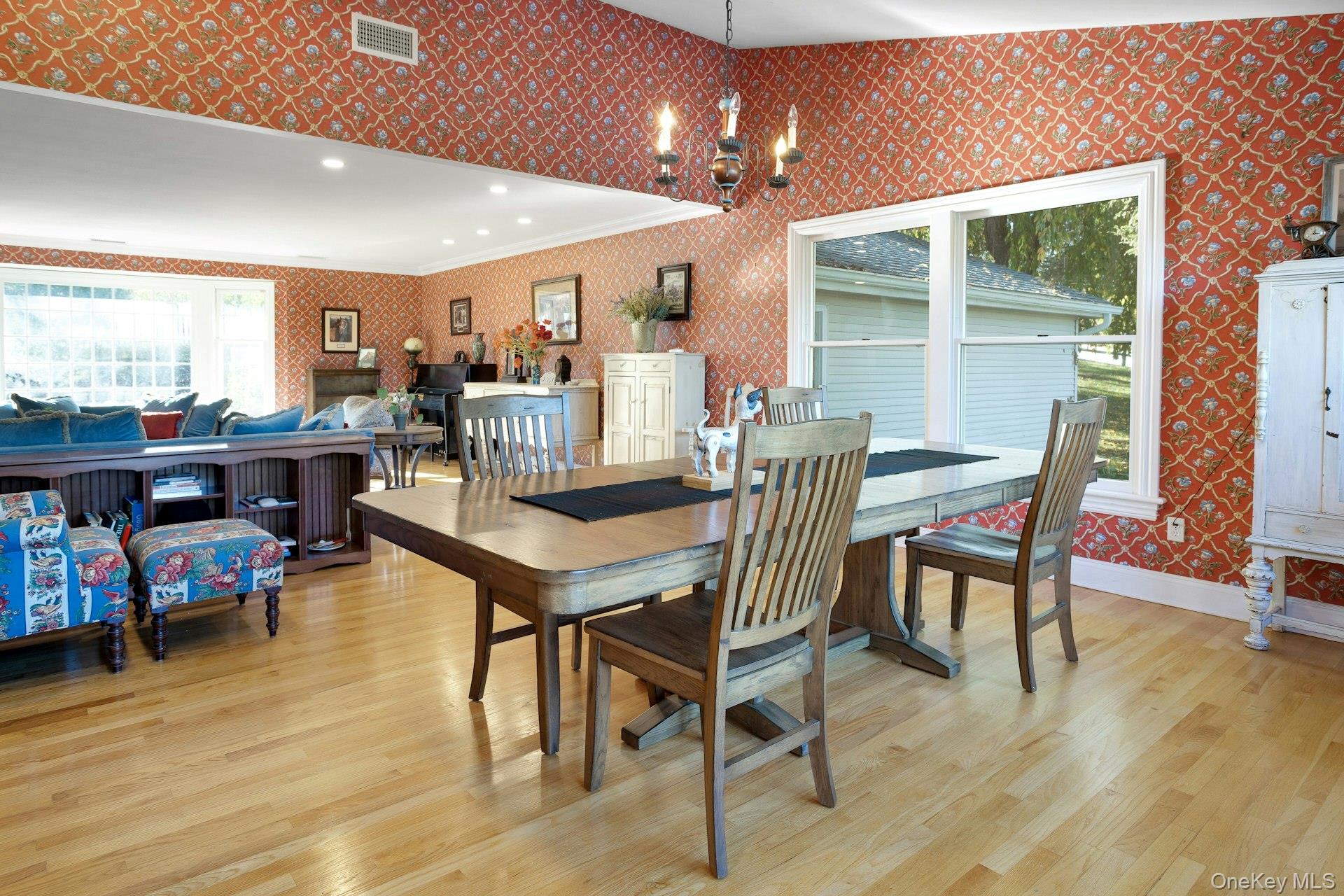 90 Cushman Road Patterson, NY 12563 - Photo 15 of 40 a view of a dining room with furniture and wooden floor