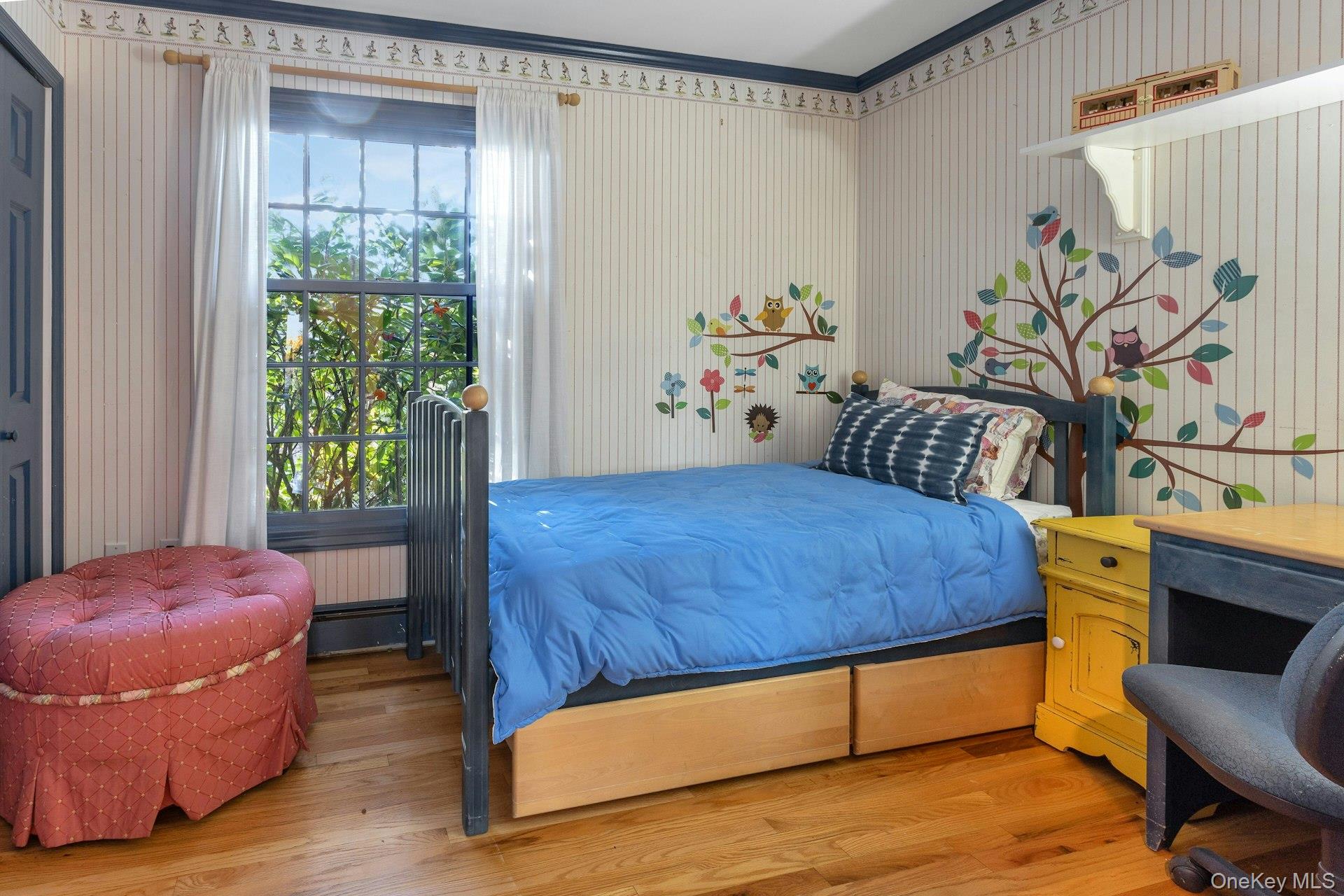 90 Cushman Road Patterson, NY 12563 - Photo 27 of 40 a bedroom with a bed and a chair