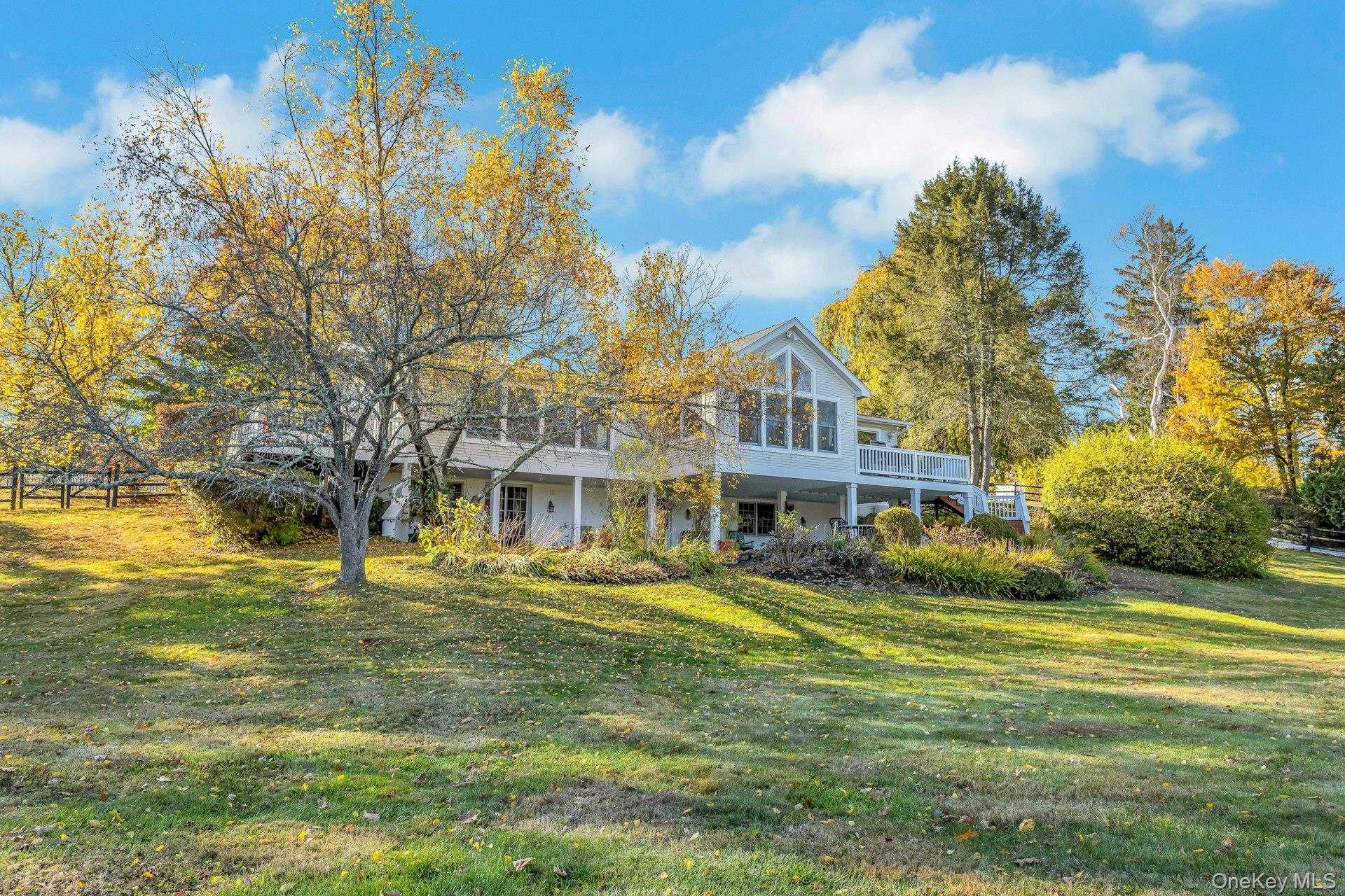 90 Cushman Road Patterson, NY 12563 - Photo 4 of 40 a view of residential houses with yard and swimming pool