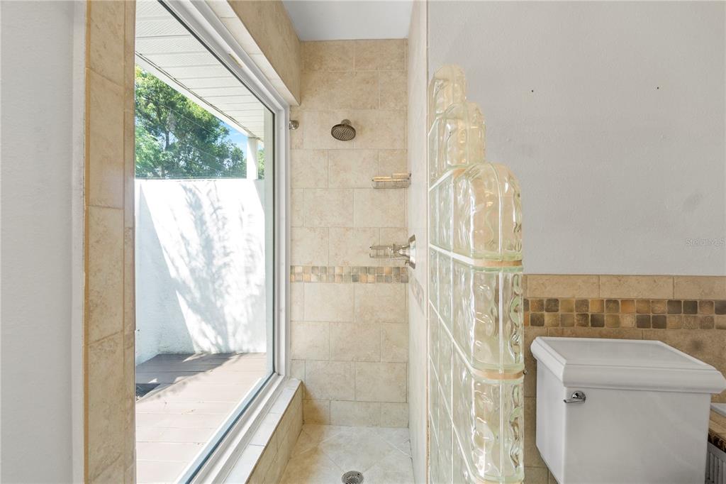 565 Sandy Hook Road Palm Harbor, FL 34683 - Photo 19 of 33 a bathroom with a shower