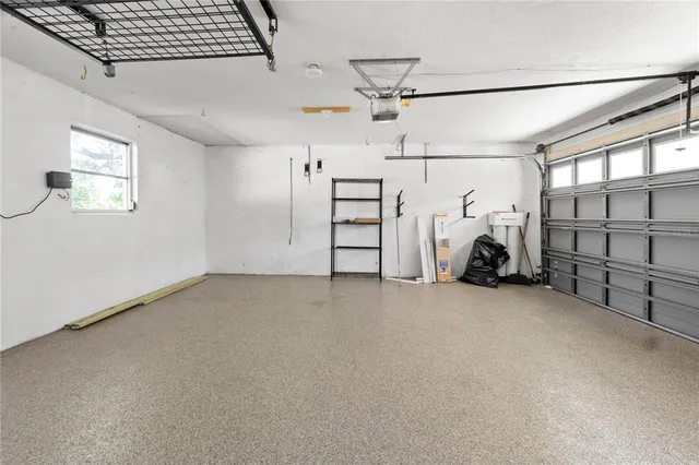 a view of a livingroom with furniture and a ceiling fan
