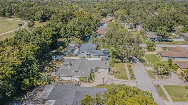an aerial view of a house with a garden