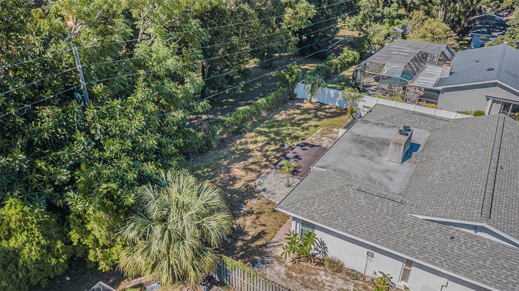 565 Sandy Hook Road Palm Harbor, FL 34683 - Photo 6 of 33 an aerial view of a house with a yard