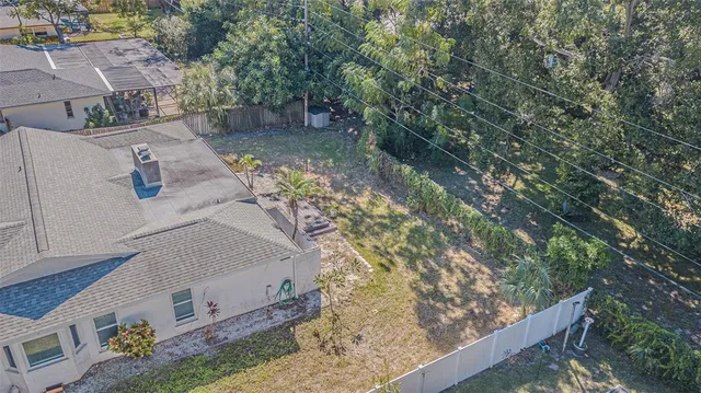 an aerial view of residential house with outdoor space