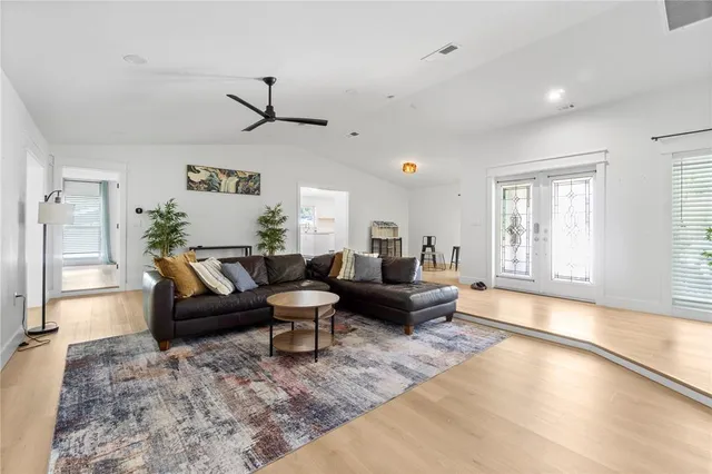 a living room with furniture or couch and a window