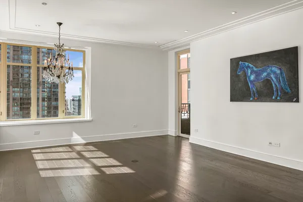 a view of a hallway with a door