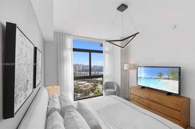 a spacious bathroom with a double vanity and a shower