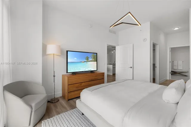 a outdoor living space with furniture and a potted plant