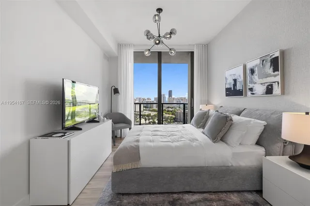 a kitchen with a table and chairs in it