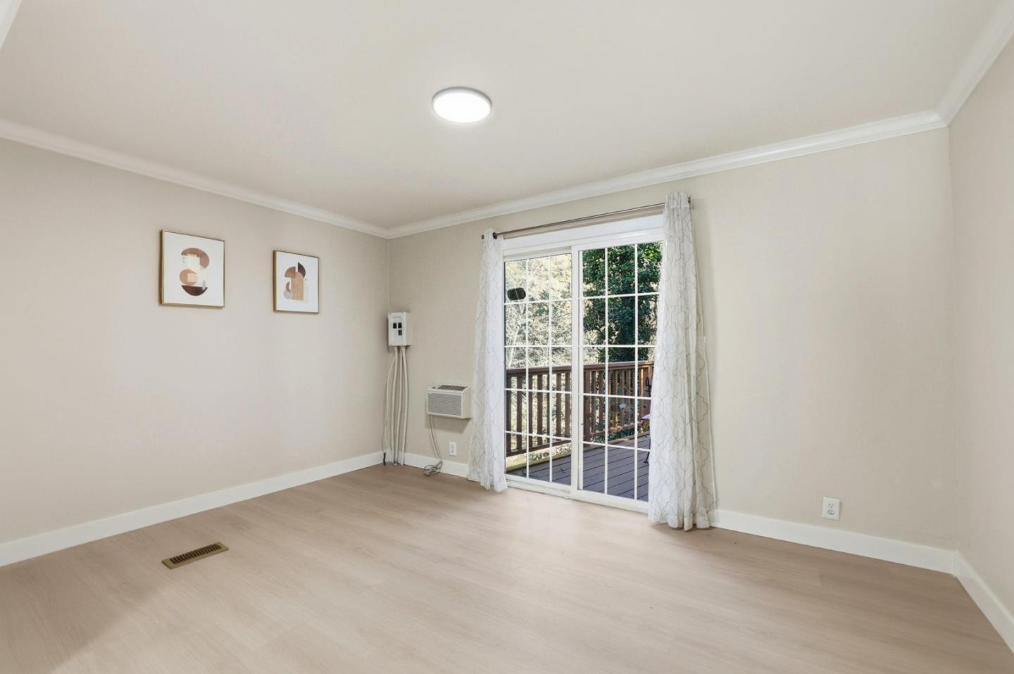 265 Brown Gables Road, Unit 11 Ben Lomond, CA 95005 - Photo 18 of 50 an empty room with windows