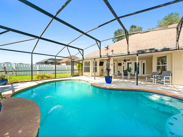 a view of a swimming pool with a porch