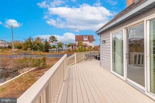 a view of balcony with furniture