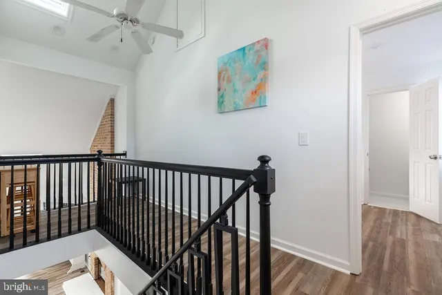 a view of entryway with wooden floor