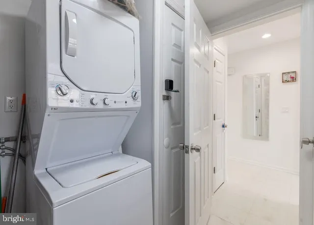 a bathroom with a sink toilet and a mirror