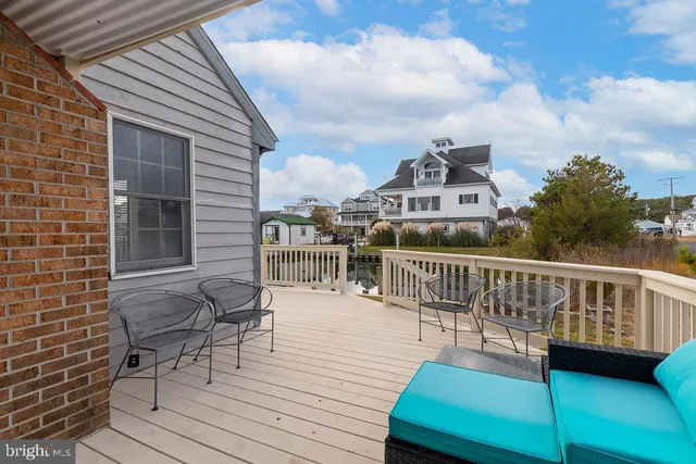 a view of a balcony with chairs