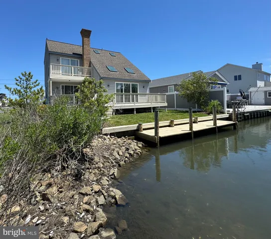 a front view of a house with a boat