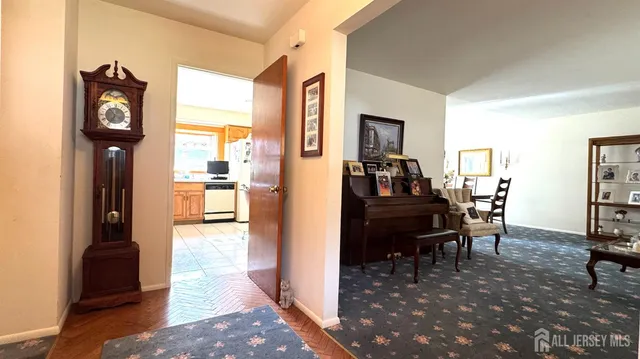 a view of a living room and dining room