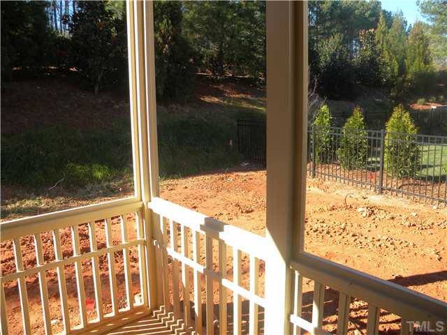 3813 Cottage Rose Lane Raleigh, NC 27612 - Photo 8 of 25 Screened in Patio with fenced in backyard Back Yard