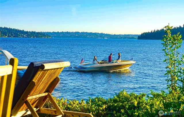 a view of a backyard with sitting area