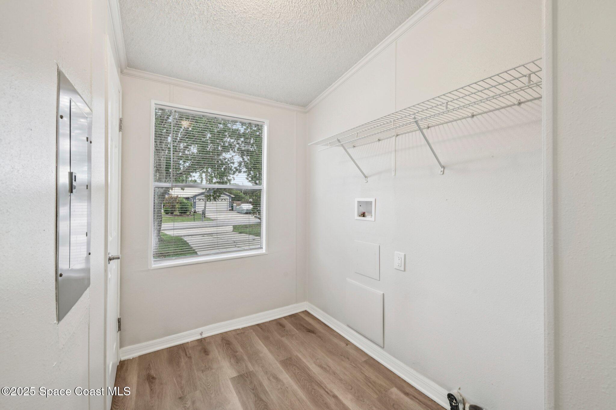 7070 Bismark Road Cocoa, FL 32927 - Photo 18 of 33 a view of an empty room with a window