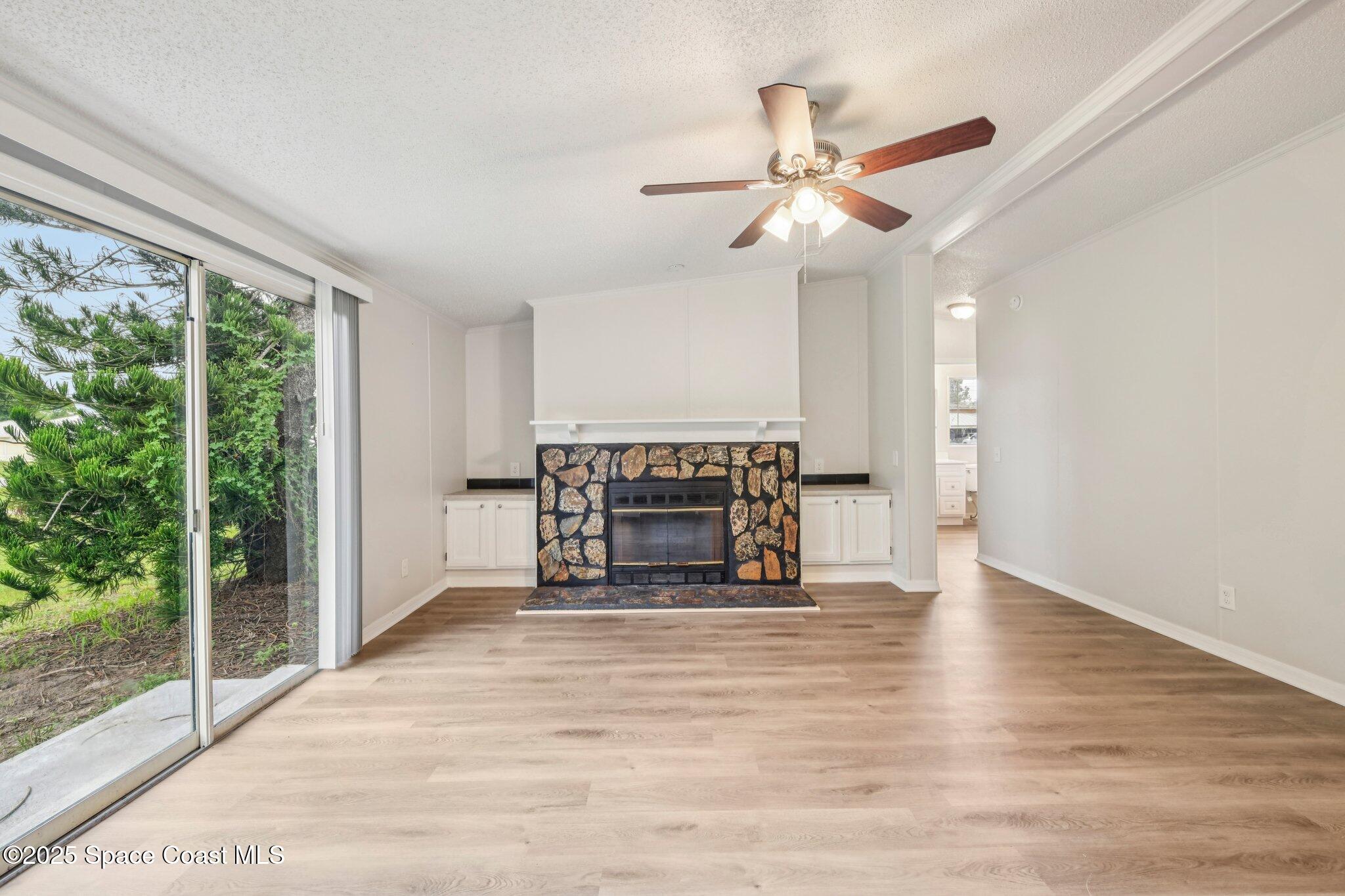 7070 Bismark Road Cocoa, FL 32927 - Photo 6 of 33 a view of an empty room with a window
