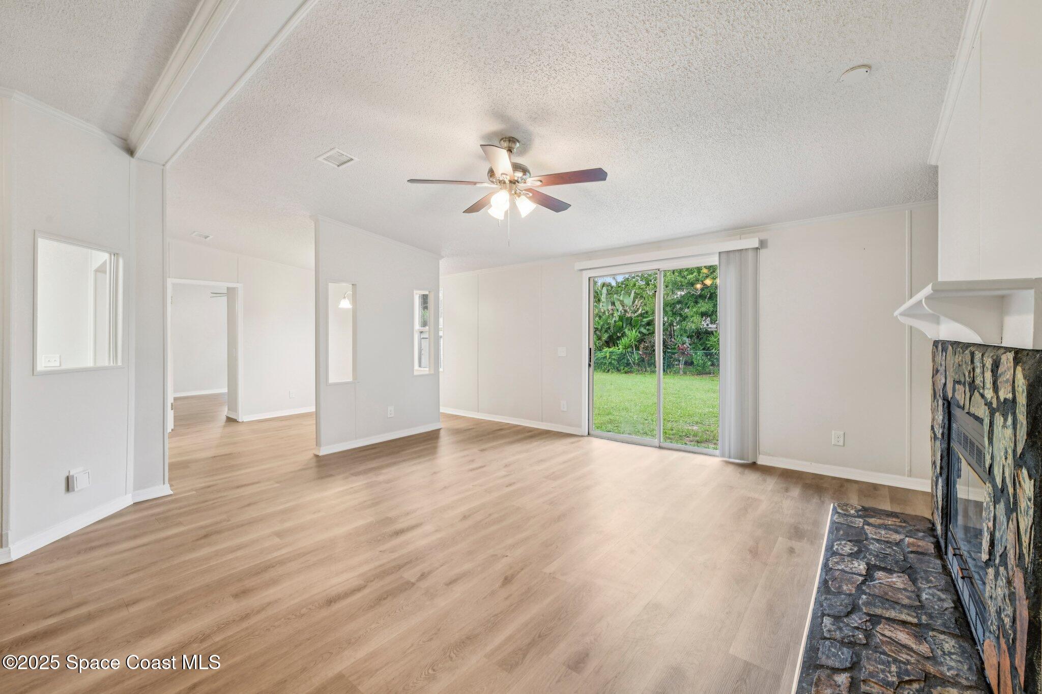 7070 Bismark Road Cocoa, FL 32927 - Photo 7 of 33 a view of an empty room with a window