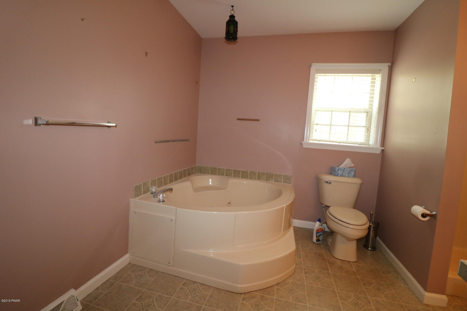 1271 Brookfield Road Lake Ariel, PA 18436 - Photo 35 of 143 a white toilet sitting next to a bathroom sink