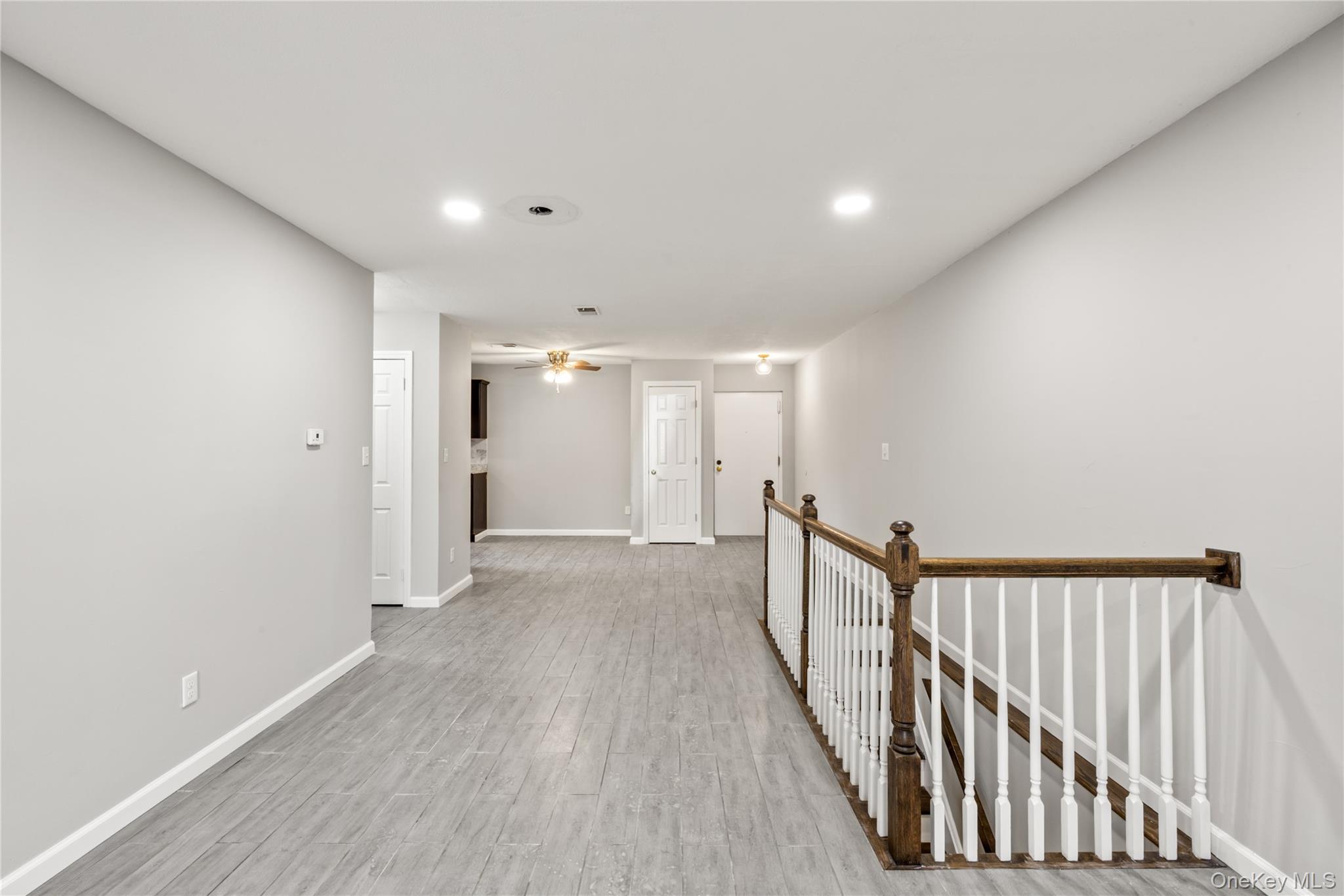 402 Kennedy Drive Spring Valley, NY 10977 - Photo 12 of 26 a view of a hallway with wooden floor