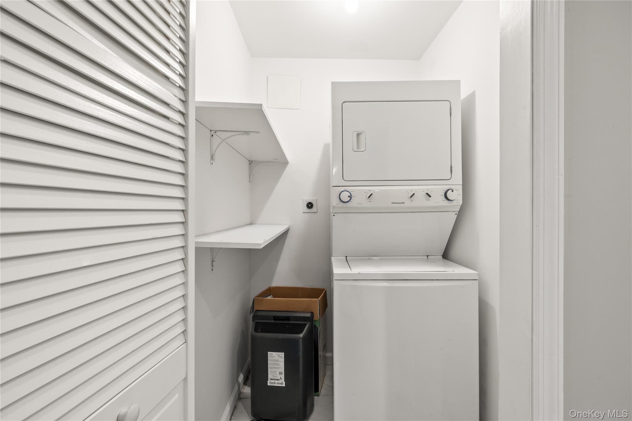402 Kennedy Drive Spring Valley, NY 10977 - Photo 21 of 26 a utility room with dryer and washer