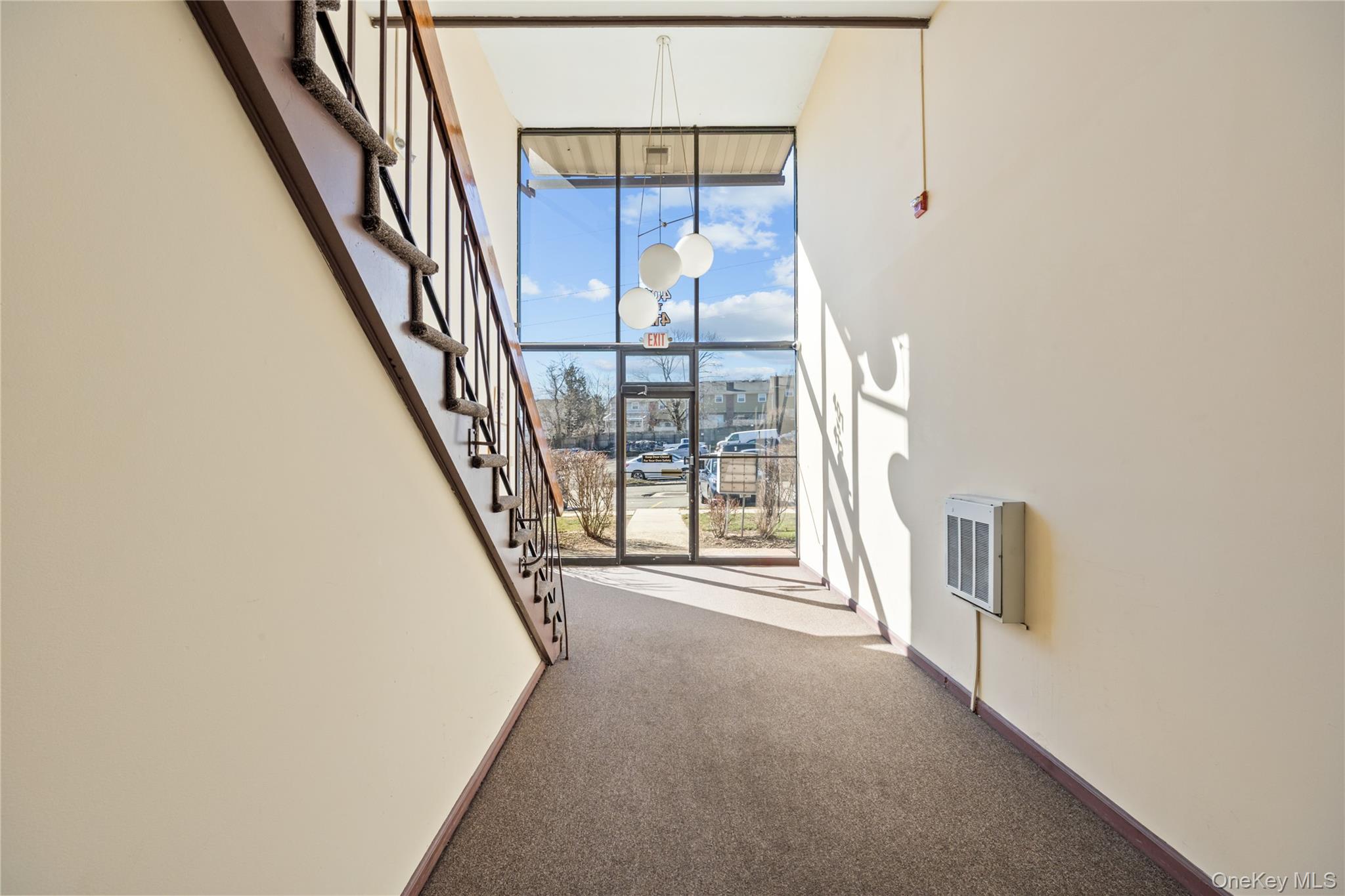 402 Kennedy Drive Spring Valley, NY 10977 - Photo 25 of 26 a view of an entryway with staircase
