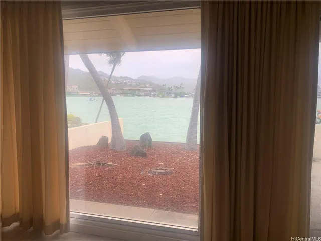 a view of a glass door with a large window