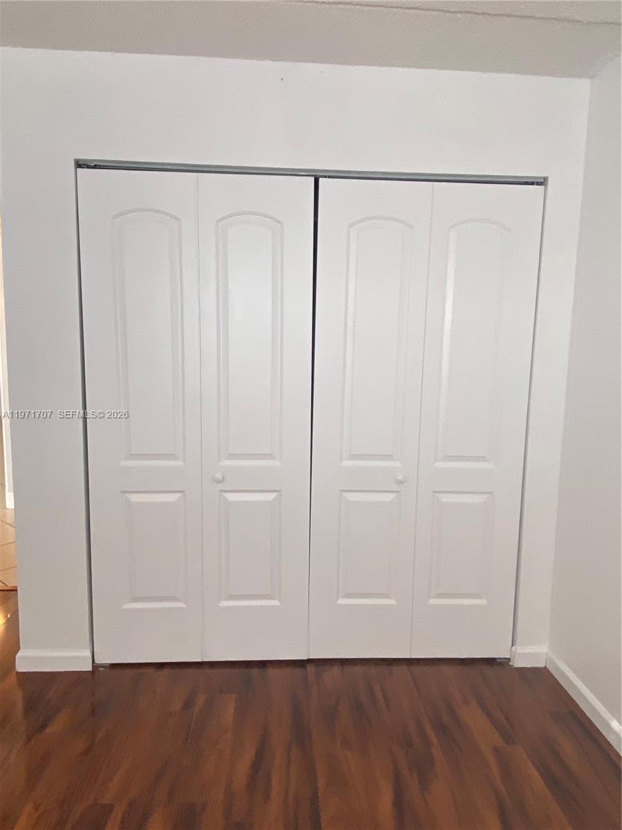 6155 Northwest 186th Street, Unit 308 Hialeah, FL 33015 - Photo 12 of 34 a view of an empty room